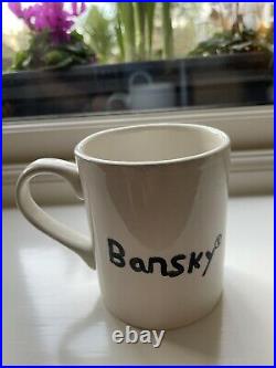 Banksy GDP Mug (As featured in Gross Domestic Product Exhibition)